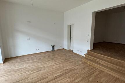 1-Raum-Wohnung mit Wohn-Essküche und Treppe zum Schlafbereich- WE21 zimmer
