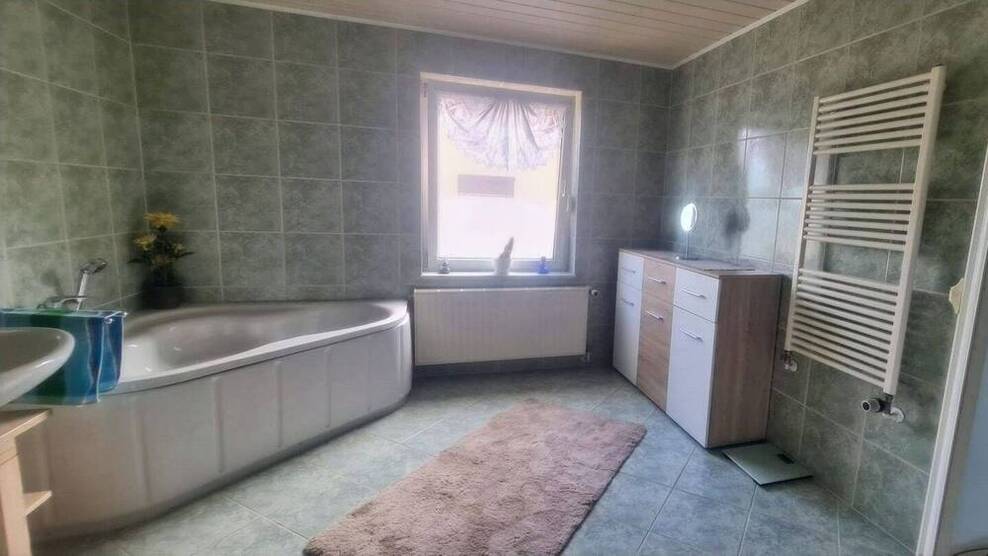 Charmante Doppelhaushälfte mit großem Grundstück in Stedten (Seegebiet Mansfelder Land)