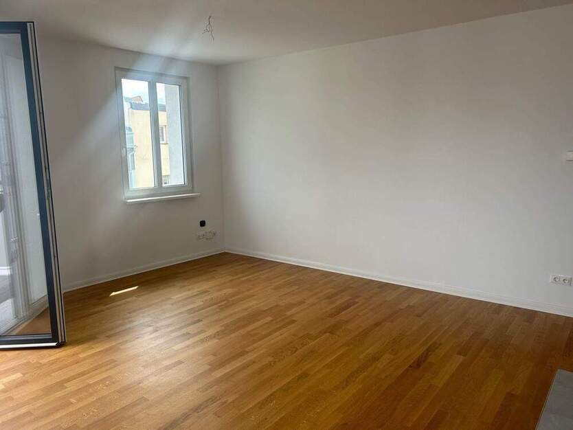 Luxuriöse 3-Zimmer-Wohnung mit Aufzug, Fußbodenheizung, Einbauküche, 2 Bädern & Wohnküche mit Balkon!