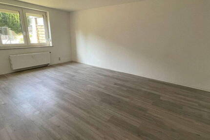 2 Zi- Whg mit EBK, TG und Garten