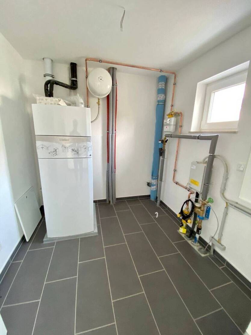 Einziehen und Wohlfühlen! Haushälfte mit Fußbodenheizung, Garage und Garten zu verkaufen! 4 zimmer