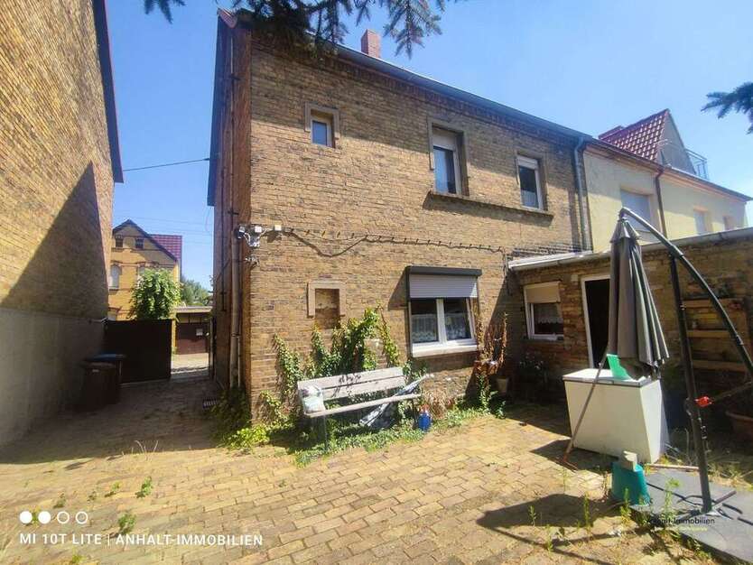 Haus zum Kaufen in Bitterfeld-Wolfen OT Holzweißig 115.000 € 116.9 m²